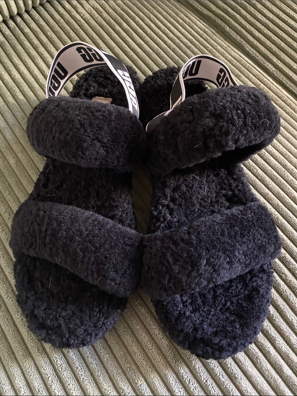 UGG  women Black Faux-Shearling Slip-On Slippers with Branded Heel Strap